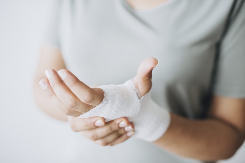 care, hands, indoors, bandage, medication, injury, front view, midsection, men, human limb, adult, human body part, hand, body part, wrap, young adult