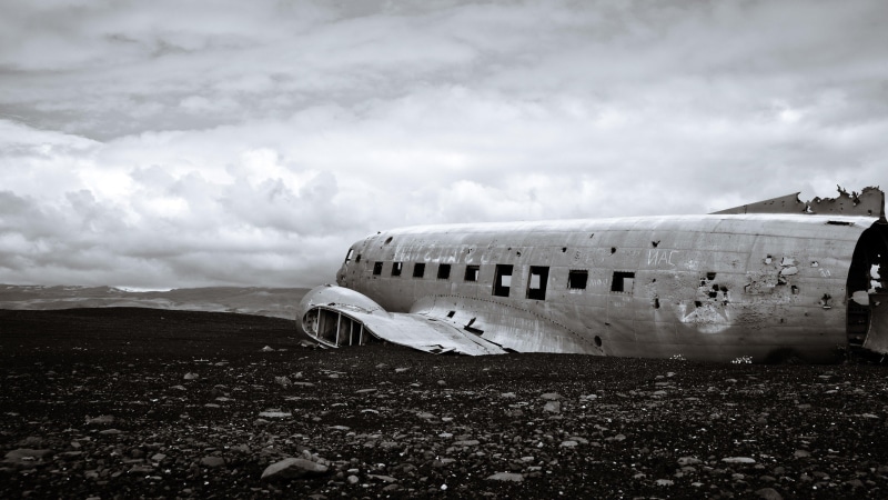 transportation, plane, beach, cloud - sky, damaged, mode of transportation, run-down, no people, sky, aerospace industry, outdoors, monochrome photography