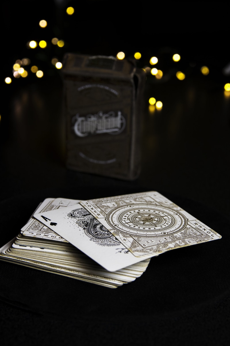 business, contraband, hundred, communication, stack, ace, gambling, no people, vegas, finance, chance, joker, restaurant, black background, card, close-up