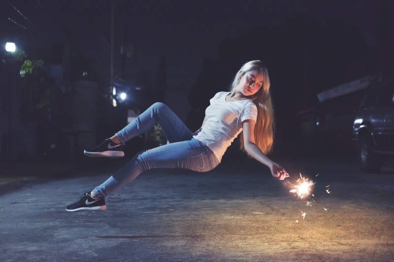 street, evening, illuminated, young adult, young women, sparklers, casual clothing, exercising, levitation, festival, light, woman, flexibility, night