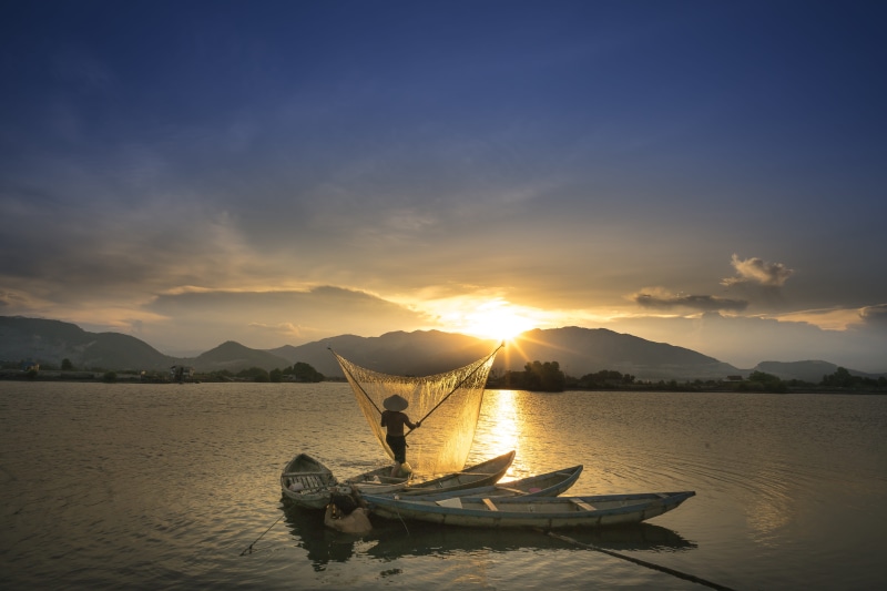 mountain range, asian, net, body, three, fishing, white, transportation, nautical vessel, cloud - sky, quiet, people, sunset, tranquil scene, the morning