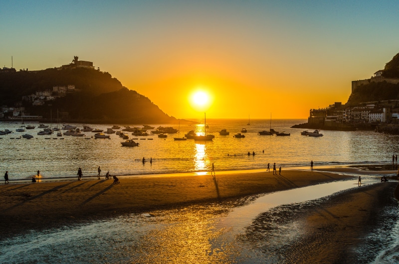 ocean, beach, sunset, nature, seascape, sunlight, walking, water, land, evening, Igeldo, travel, people, tranquility, sun, reflection, idyllic, outdoors