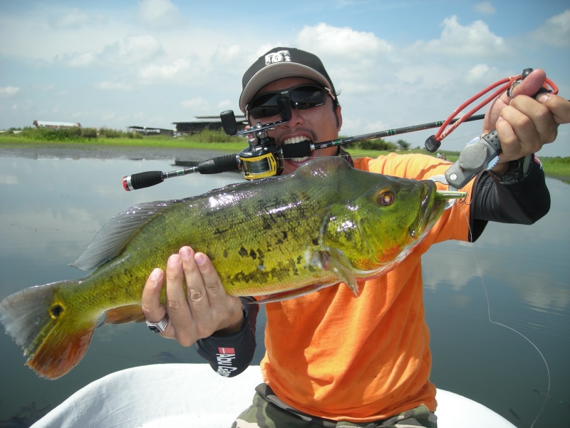 lifestyles, reel, rod, men, hobby, cloud - sky, safety, sport, black, freshwater, waist up, leisure activity, adult, 2K, day, helmet, Casting, biting