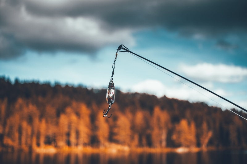 tranquil scene, water, no people, bait, sky, day, focus on foreground, cloud - sky, fishing, hook, recreation, environment, beauty in nature, mountain