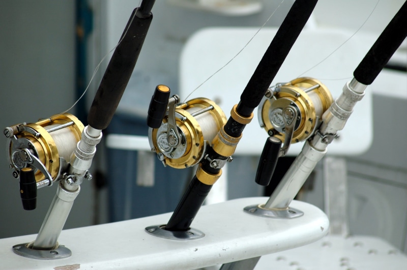 gear, indoors, untitled, still life, summer, angler, vacation, activity, flooring, game fishing, arts culture and entertainment, sport, fishing reels, relaxation