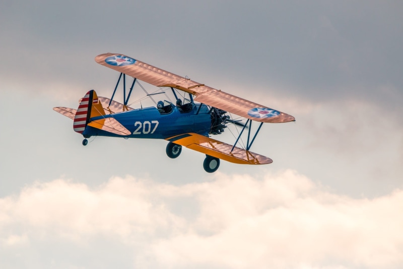 biplane, vintage aircraft, human arm, freedom, brown, double decker, full length, fly, flying, one person, adventure, leisure activity, flight days soest 2017