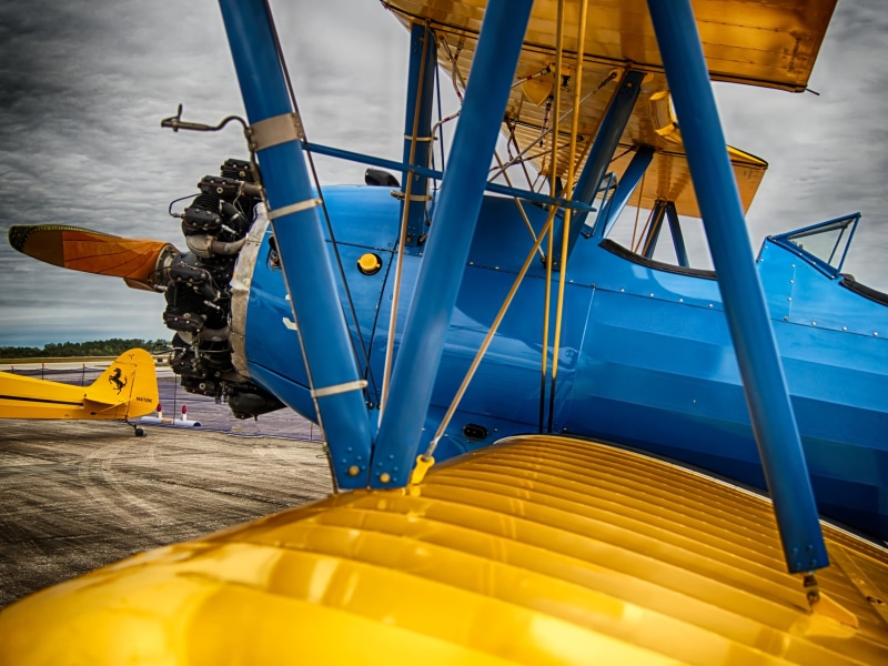 4K, moored, transportation, water, vintage, bi-plane, blue, sea, boeing stearman, flying, aircraft, no people, mode of transportation, airplane, built structure