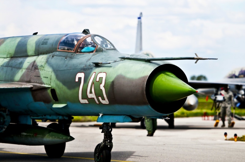 green color, airshow, incidental people, history, mikoyan, flying, old-fashioned, air Vehicle, obsolete, propeller, weapon, black, sky, cockpit, nature