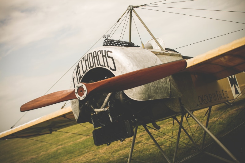 airplane, 4K, mode of transportation, retro Styled, transportation, mode of Transport, nature, wood - material, outdoors, air Vehicle, low angle view