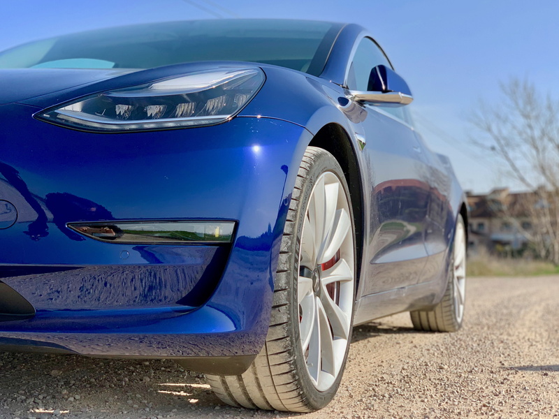 trademark, automobile, no people, transportation, land vehicle, madrid, alloy wheel, car, close-up, reflection, blue, road, motor vehicle, day, spain, machine