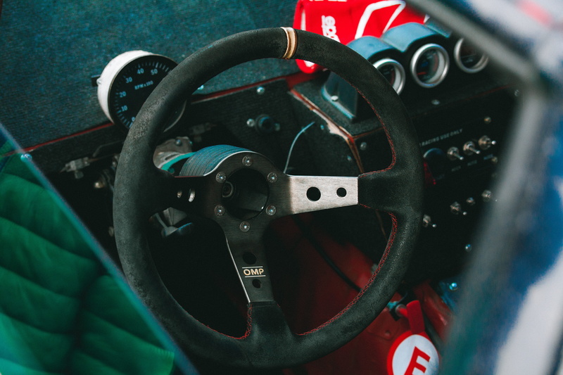 racecar, 5K, cars, tachometer, drift, race, day, mode of transportation, car, machine, travel, helmet, contest, tire, motor vehicle, safety, gauge, control panel