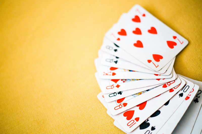yellow background, photo, arts culture and entertainment, focus, game of chance, hearts, gambling, still life, close-up, blur, no people, playing, heart shape