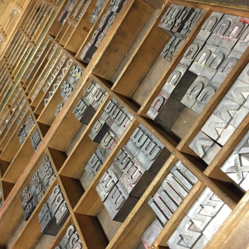 full frame, in a row, choice, letter, print, architecture, text, backgrounds, container, design, printmaking, indoors, shelf, press, variation, large group of objects