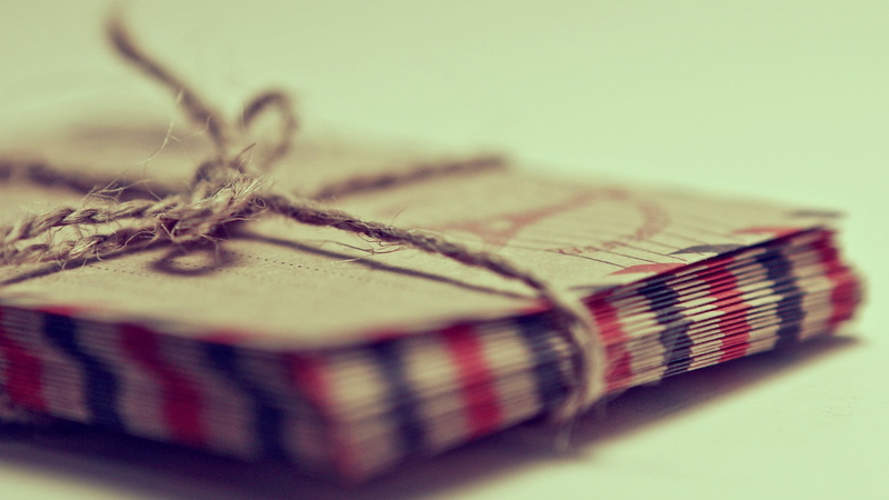 craft, single object, stack, material, creativity, selective focus, studio shot, still life, no people, basket, thread, tied up, letter, brown, two objects