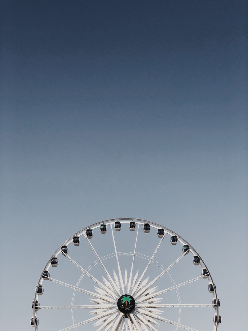 low angle view, daytime, music, amusement park, copy space, ferris wheel, nature, coachella, coast, sky, white, arts culture and entertainment, aerial