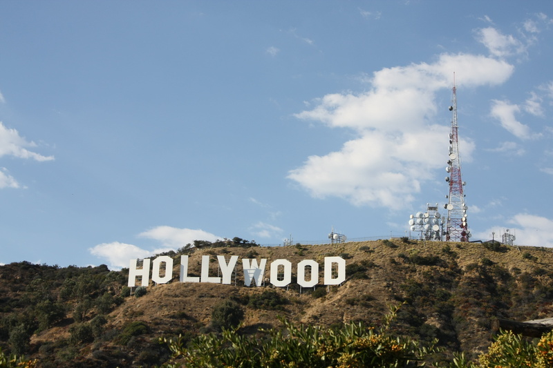 low angle view, tall - high, no people, tourism, landmark, hollywood, usa, communication, outdoors, tree, built structure, architecture, travel, travel destinations