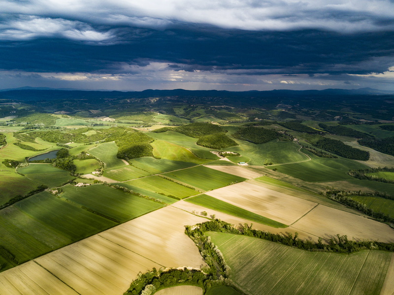 flying, covered, mid-Air, aerial View, aerial, clouds, nature, green, beauty in nature, rolling landscape, cloud, scenics - nature, soil, outdoors, high Angle View