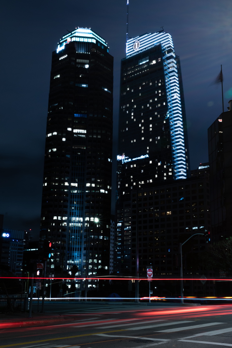 light trail, spire, blue sky, los angeles night, high rise, downtown, tower, building, night, sky, building exterior, metropolis, office, lighting equipment