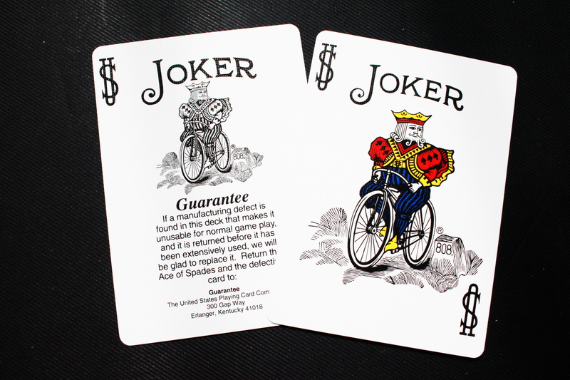 leisure activity, indoors, studio shot, white background, magic, sport, cards, card, text, human representation, two, healthcare and medicine, badge, playing