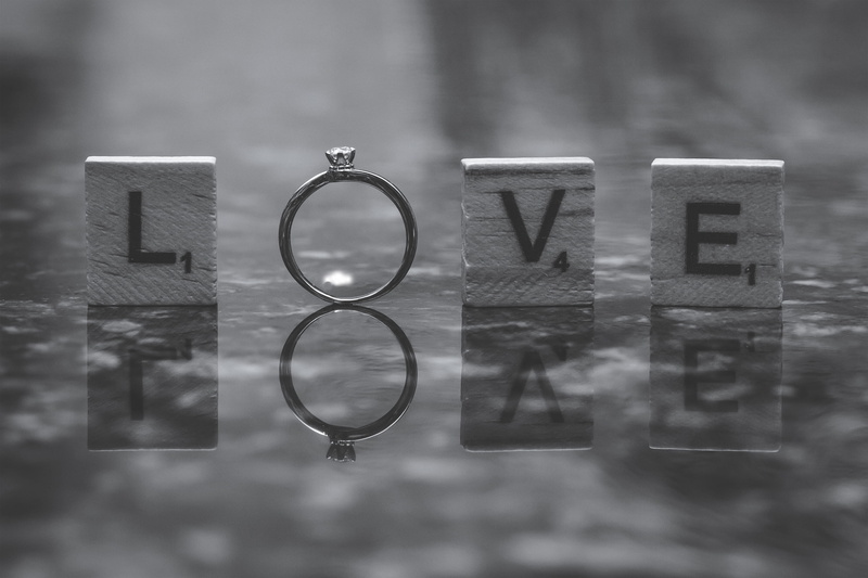 reflection, text, single word, selective focus, alphabet, indoors, western script, day, capital letter, rings, wedding, bride, ring, minecraft, wood - material