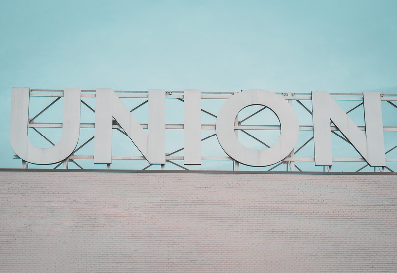 built structure, 2K, sky, handrail, capital letter, union market, wall, billboard, clear sky, food, architecture, communication, text, western script