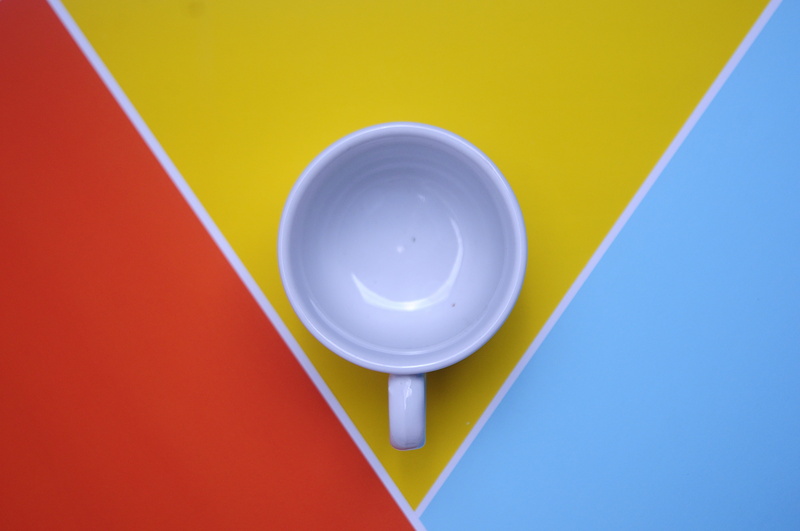 blue background, disjunct, card, high angle view, graphic design, empty plate, no people, indoors, graphic, sign, white, blue, shape, minimalist, ceramic