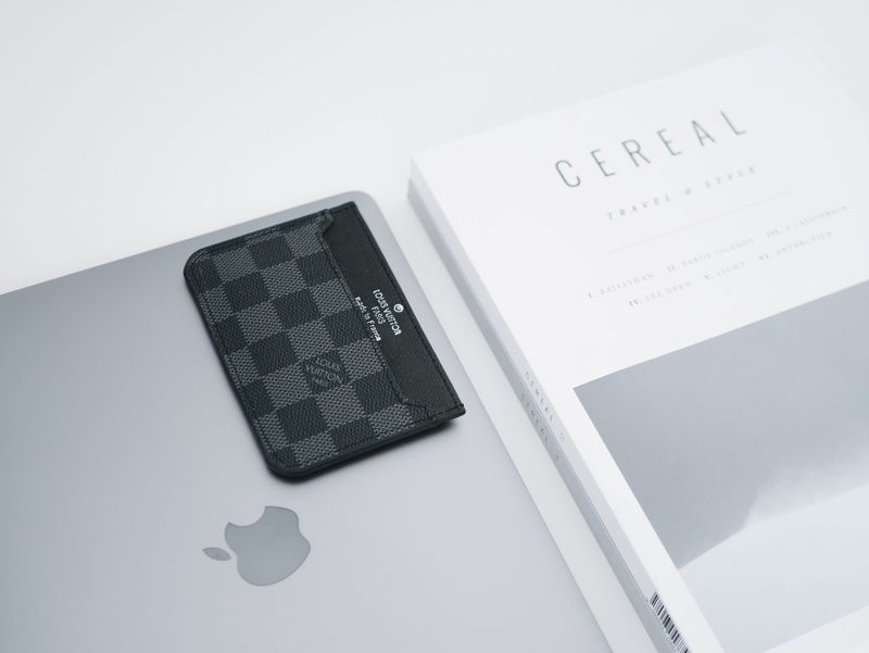 business, white background, western script, book, publication, computer, fashion, minimalism, tech, still life, louis vuitton, studio shot, macbook pro