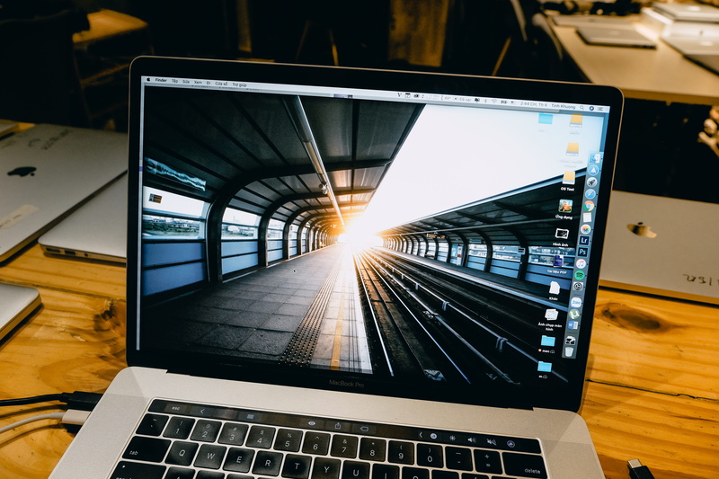 public transportation, touchbar, technology, macbook silver, communication, laptop, sky, workplace, sunlight, indoors, wireless technology, macbook pro