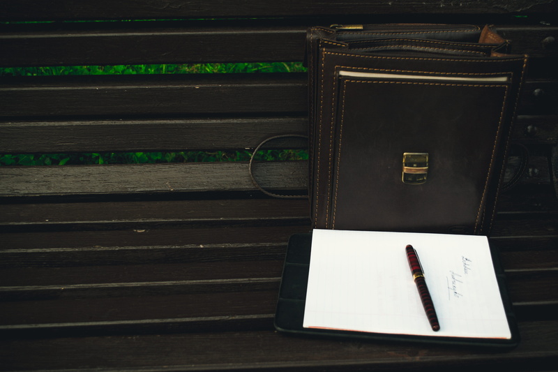 green, pen, note pad, letterpress, wood - material, lettering, writing instrument, no people, brown, high angle view, pencil, bag leather, publication