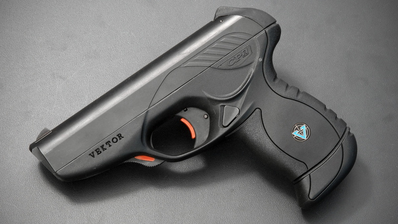 2K, high angle view, power supply, close-up, technology, computer equipment, pistol, gun, security, computer mouse, indoors, no people, single object