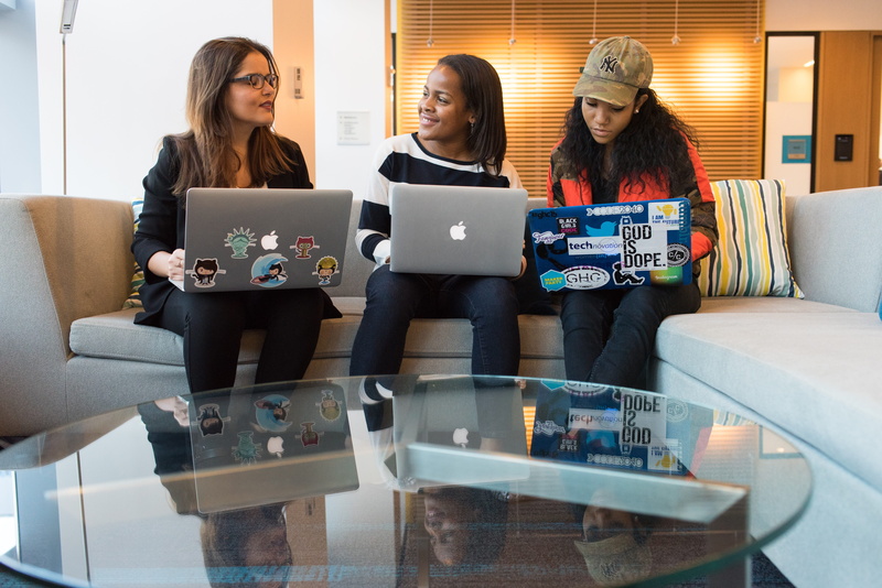 glass table, sofa, wireless technology, business, women, young women, coder, desk, technology, developers, woman, connection, couch, sitting, adult, laptop