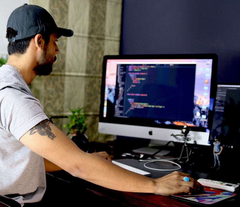 hard work, designer, furniture, apple, design, table, technology, young men, young adult, looking, one person, sitting, connection, coder, information technology