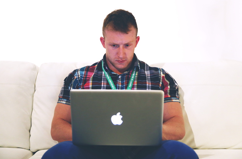 wireless technology, men, coder, sitting, conference, white, programming, couch, communication, indoors, man, startup, programmer, using, learning, job