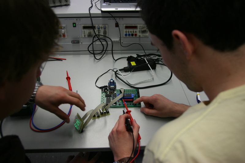 teamwork, computer, equipment, cable, board, occupation, holding, student, accuracy, computer science, working, white, students, top, over the shoulder view