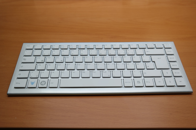 technology, table, single object, internet, leave, desk, white, letters, no people, business, studio shot, wireless technology, pC, wood - material, calculator