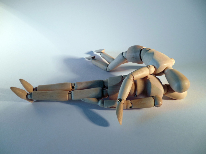 technology, figure, brown, art and craft, representation, copy space, studio shot, victims, mouth to mouth, accident, two, creativity, action, artificial respiration