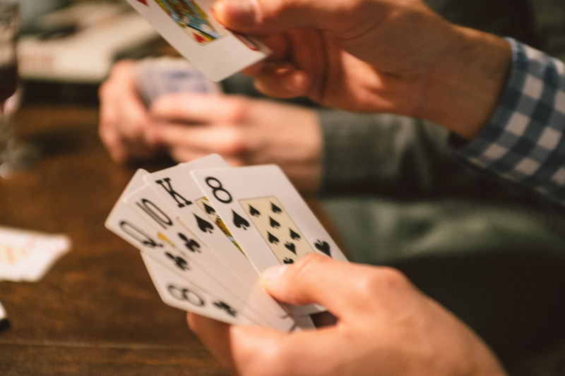 leisure activity, poker - card game, color Image, chance, focus on foreground, card, one Person, adult, men, arts culture and entertainment, human Hand