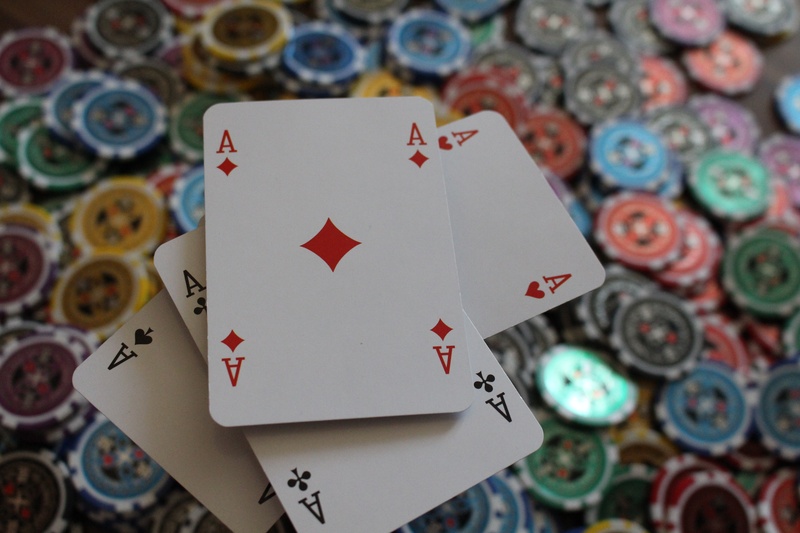 gambling, heart shape, indoors, high angle view, poker, no people, luck, close-up, success, red, casino, winning, leisure games, background, relaxation