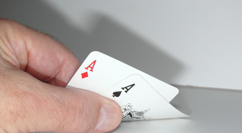 arts culture and entertainment, ace, human limb, play, entertainment, pair, card game, playing, playing cards, gambling, risk, casino, poker - card game