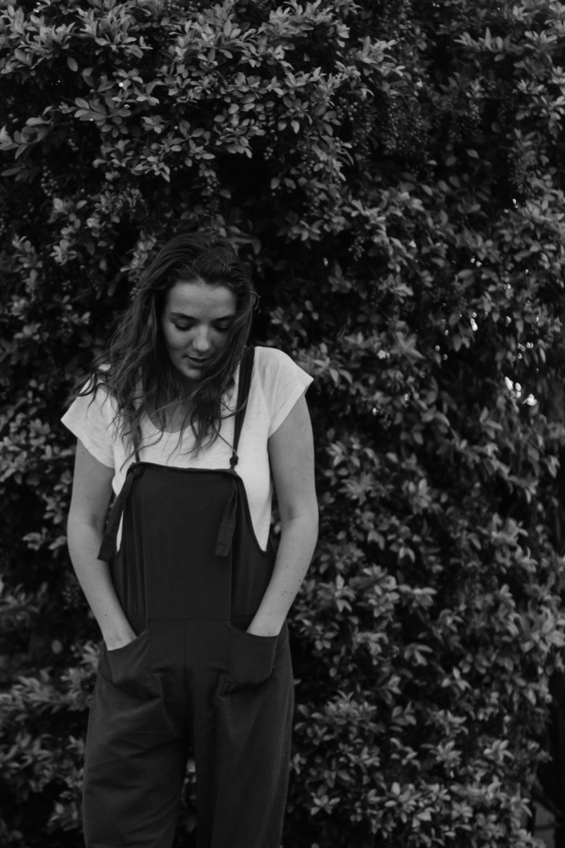 undershirt, girl, female, clothing, portrait, casual clothing, hairstyle, photography, tree, contemplation, outdoors, young adult, young women, plant, front