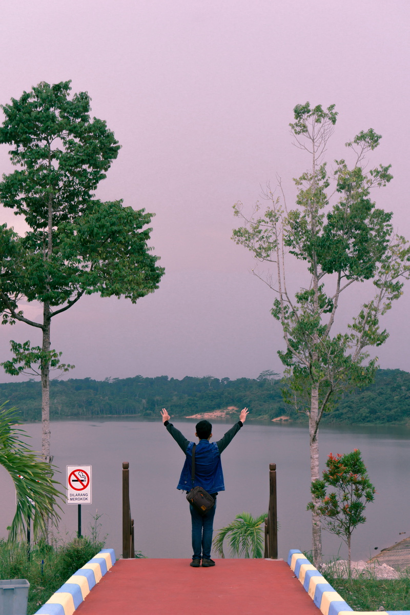 5K, rear view, outdoors, plant, human, flower, one person, casual clothing, arms raised, vegetation, clothing, day, person, human arm, men, real people
