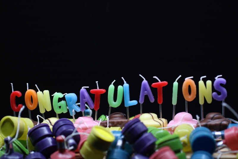 party poppers, temptation, no people, close-up, plastic, chopping board, choice, 5K, black background, studio shot, indulgence, selective focus, cakes