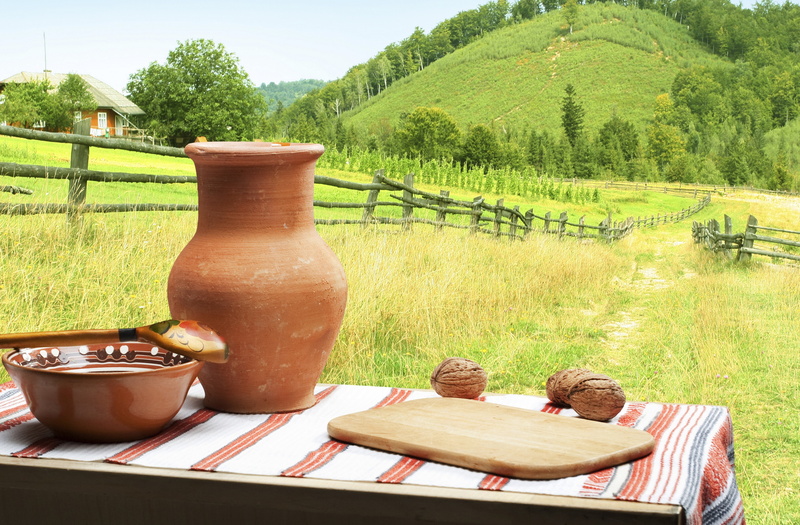 food, beige, table, bowl, tranquility, summer, refreshment, clay, cultures, tranquil scene, drink, wood - Material, two people, glass, rustic, three, jar