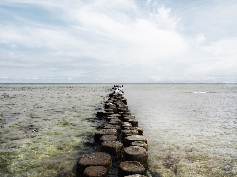 land, tranquil scene, outdoors, baltic sea, solid, no people, water, stack, mood, nature, pebble, idyllic, non-urban scene, 4K, wooden post, coast, rock