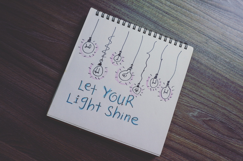 handwriting, page, drawing - art product, still life, memo, light, creativity, shine, western script, close-up, communication, drawing, high angle view