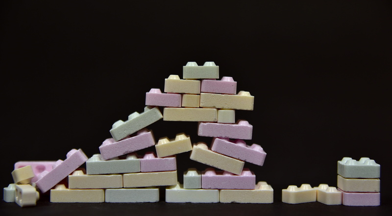 stack, candy, broken, multi colored, still life, wall, food and drink, colorful, destroyed, leaking, food, site, sugar, large group of objects, temptation