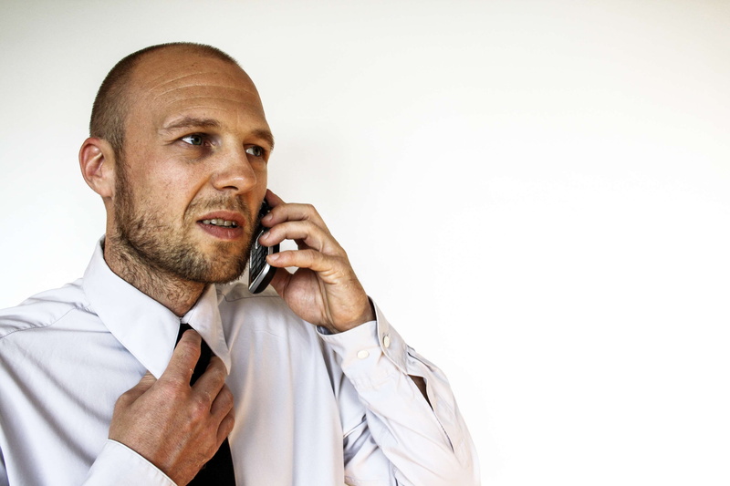 males, listen, bar, necktie, studio shot, menswear, talk, white background, telephone interview, mobile phone, indoors, speak, businessman, men, phone call