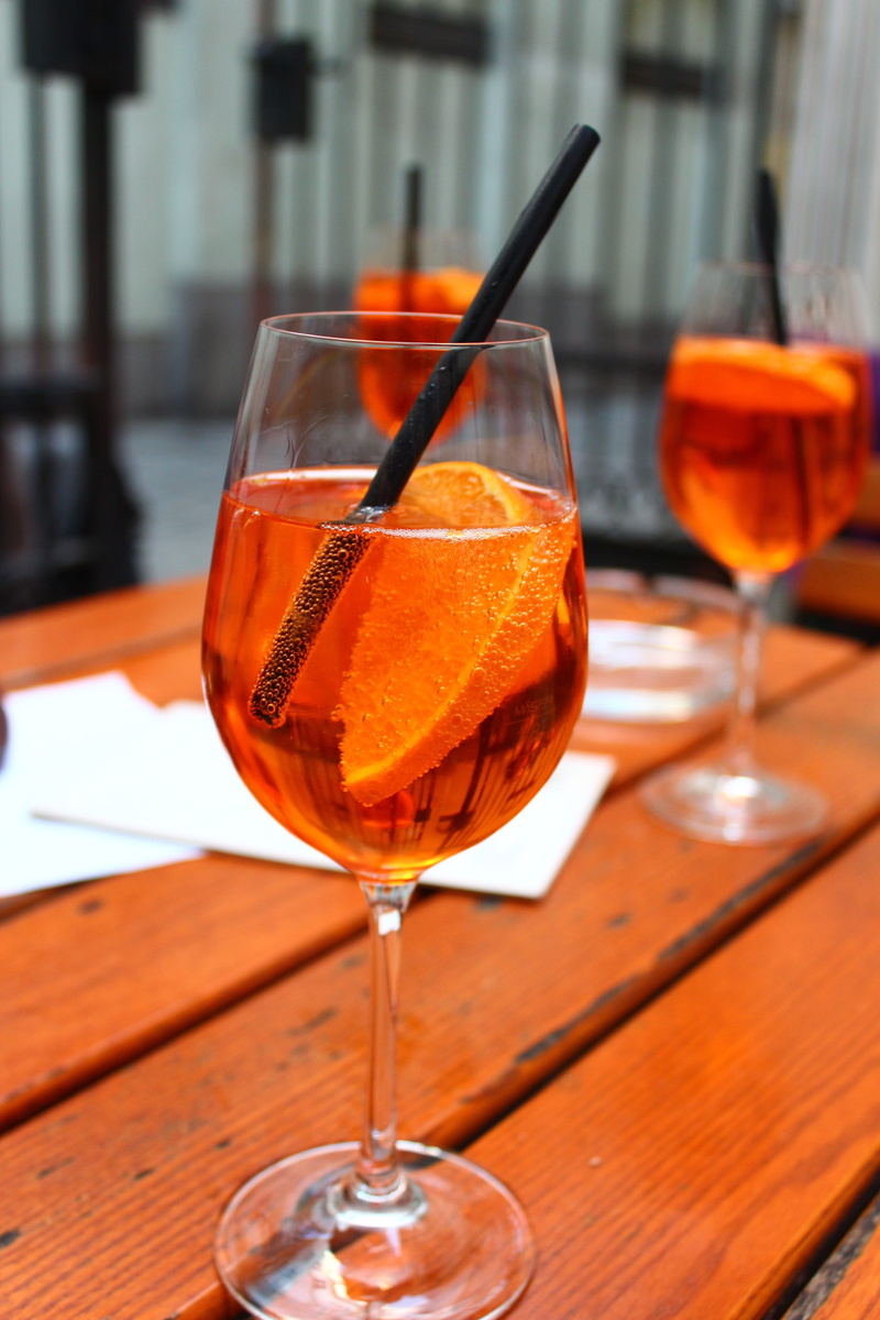 summer, restaurant, aperitif, 5K, food and drink, alcohol, alcoholic, freshness, aperol spritz, wineglass, red wine, no people, focus on foreground, stimulant