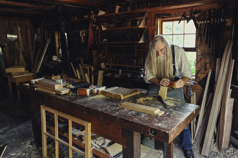 casual clothing, craft, wood - material, trade, holding, skill, small business, standing, work tool, adult, real people, tool, 2K, working, table, occupation