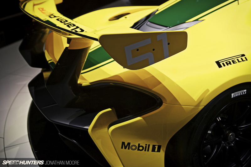 text, land vehicle, high angle view, McLaren, yellow, full frame, sign, Super Car, communication, race cars, 1080P, western script, stationary, car, mode of transportation